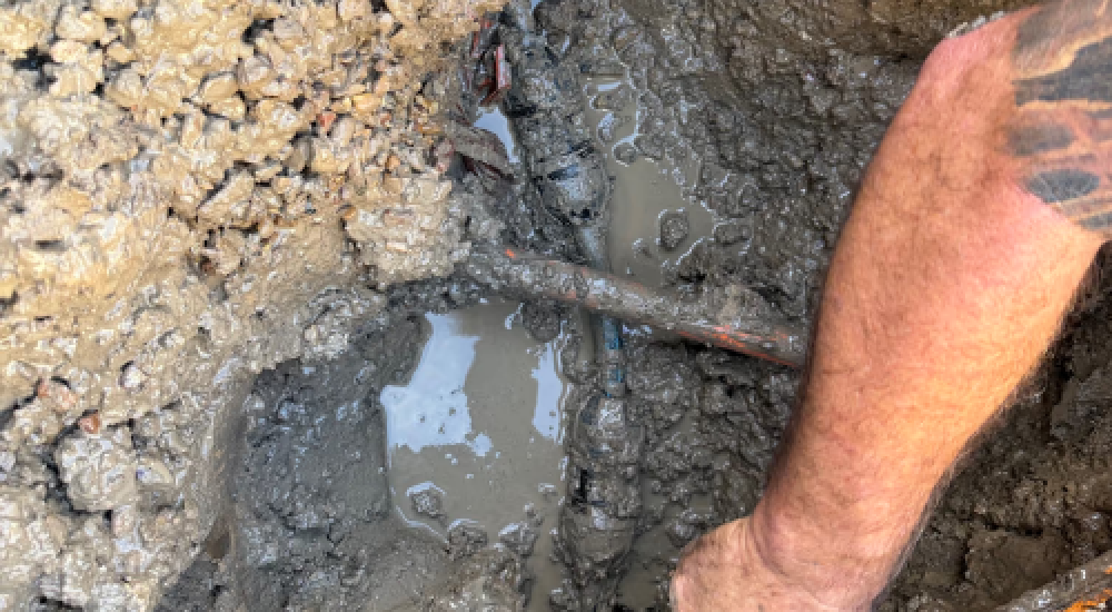 plumber using hydrogen leak detection equipment on underground pipe Hervey Bay